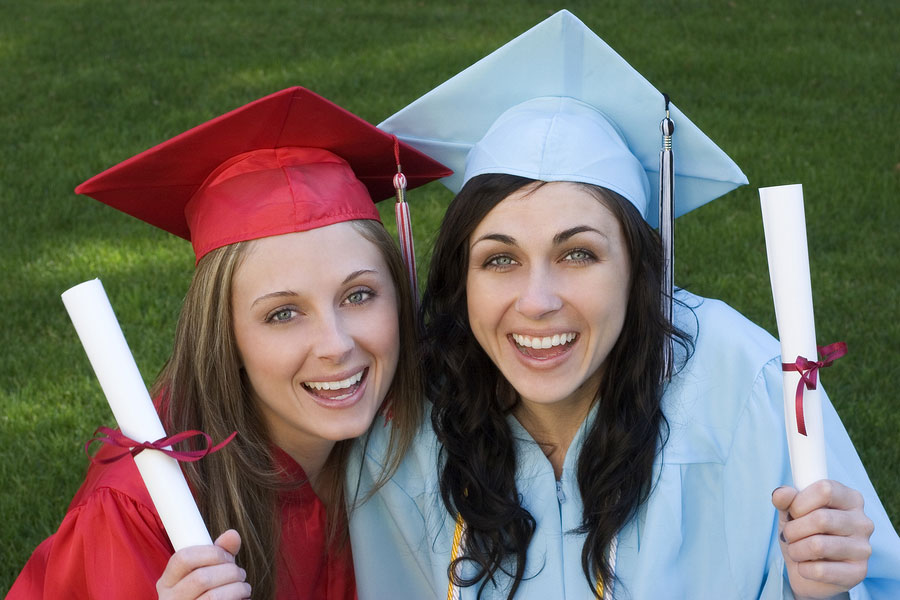 two girls celebrating their high school graduation