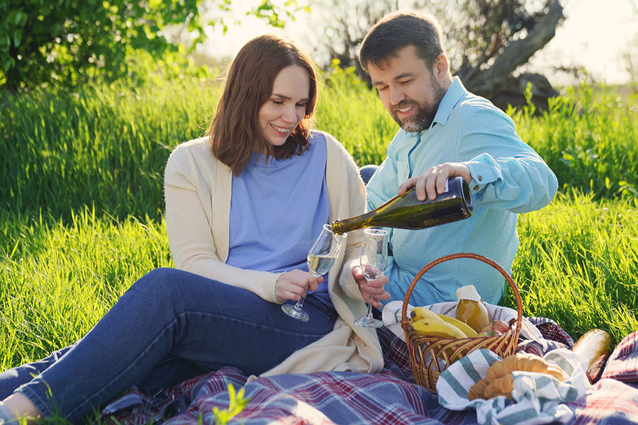 couple enjoying a lovely picnic outdoors